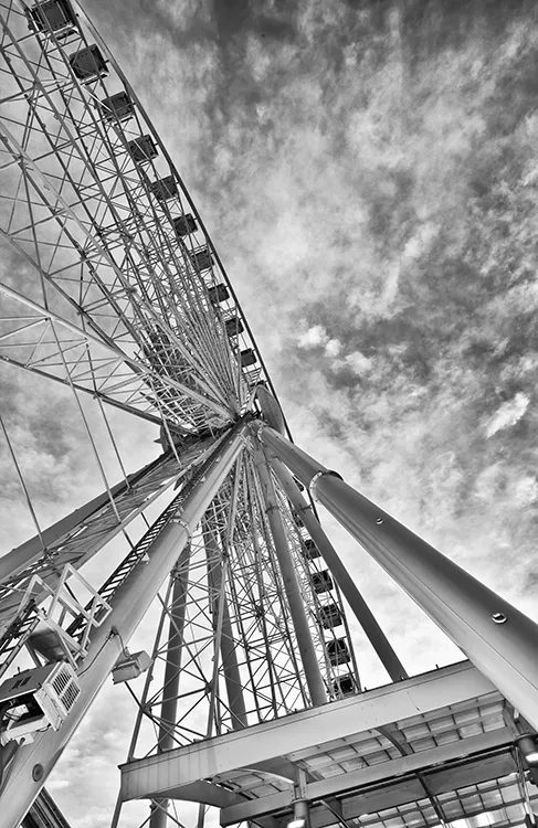 The view of a Ferris wheel from below