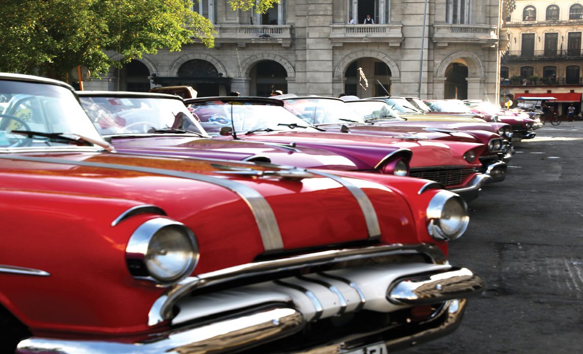 A row of red classic cars
